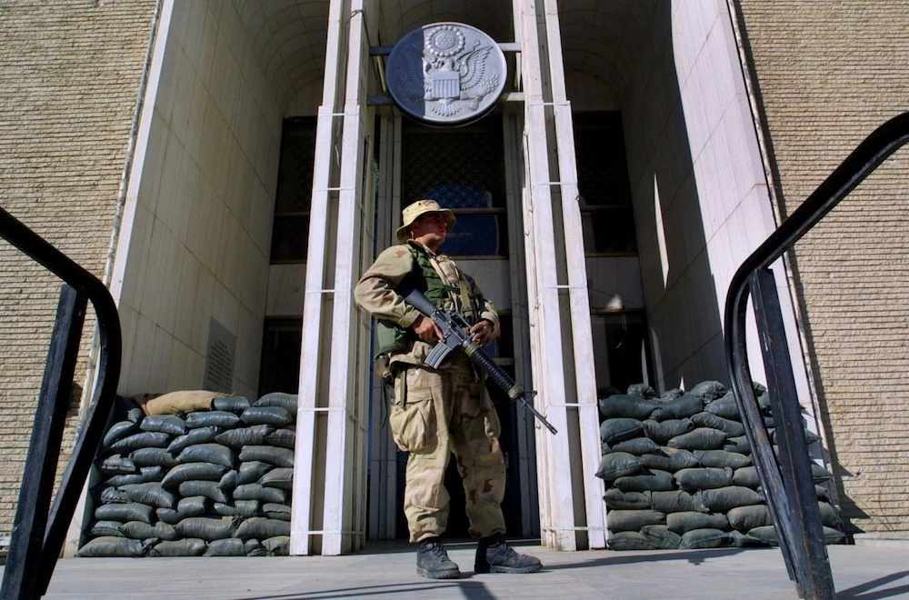 A Marine stands guard in front of the US embassy in Kabul, Afghanistan. (Getty Images)