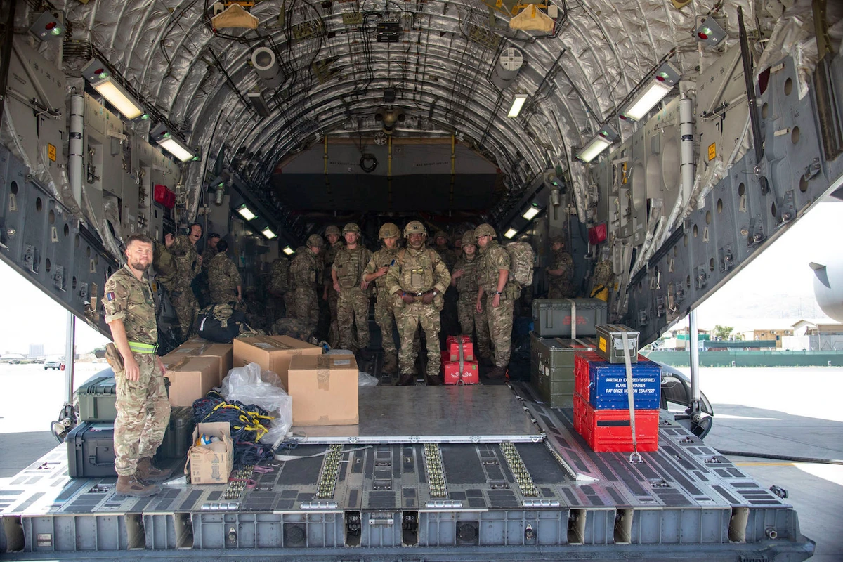UK troops in Kabul; UK lawmakers recalled for crisis talks