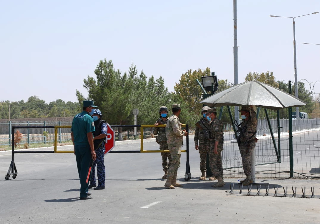Border guards man a checkpoint on the Uzbekistan-Afghanistan border in Ayritom, Uzbekistan, August 15, 2021. (Reuters)