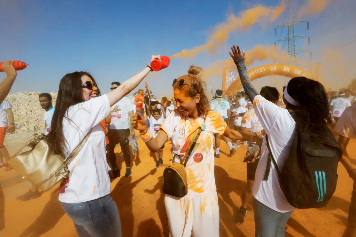 Women attend the Colour Run event during Riyadh season festival, in Saudi Arabia, in this file photo taken on October 26, 2019. (REUTERS)