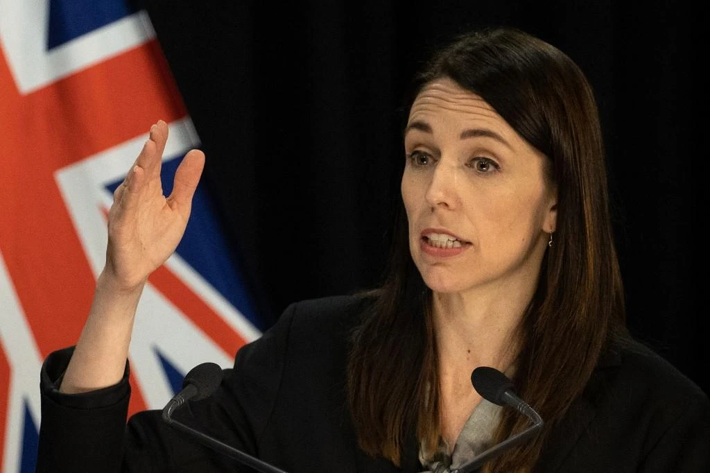 ‘The best thing we can do to get out of this as quickly as we can is to go hard,’ New Zealand’s Prime Minister Jacinda Ardern said. (AFP)