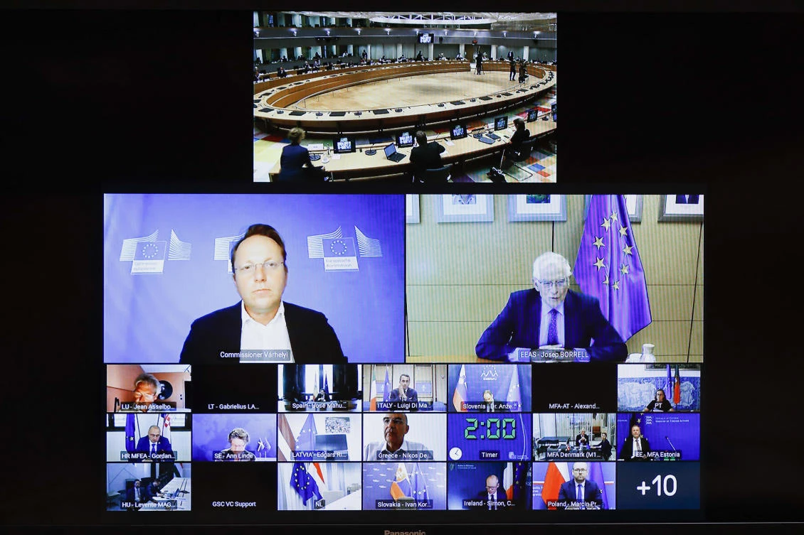 European Union foreign policy chief Josep Borrell, screen middle right, speaks with EU foreign ministers in an extraordinary Foreign Affairs Council to take stock of the situation in Afghanistan, via video link, on Tuesday. (AP)