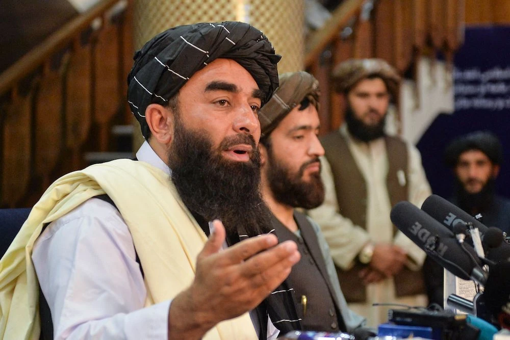 Taliban spokesperson Zabihullah Mujahid speaks during the first press conference in Kabul following the Taliban's takeover of Afghanistan. (AFP)