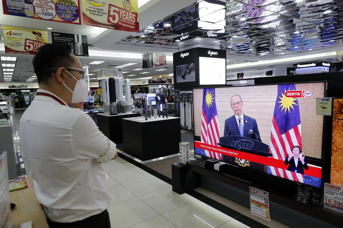 Muhyiddin Yassin resigned as prime minister on Monday after conceding he had lost his majority in parliament. (AP)