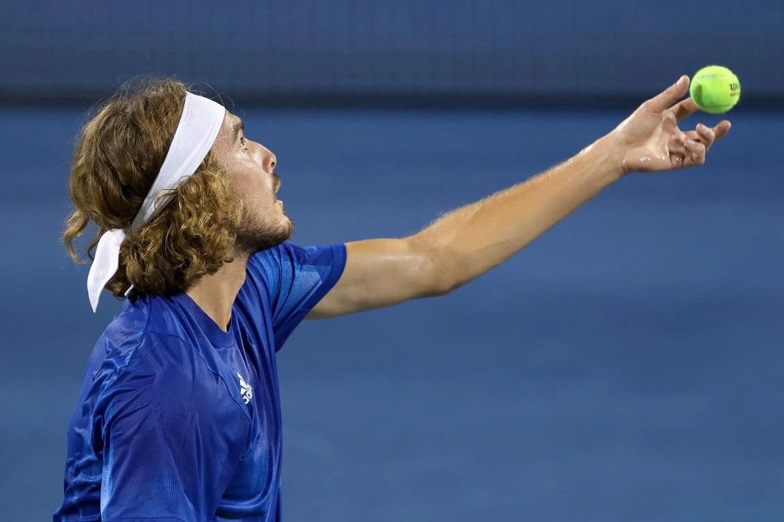 Greece’s Stefanos Tsitsipas serves during his match against Sebastian Korda during Western & Southern Open in Ohio. Greek government on Thursday criticized Tsitsipas for insisting he would only get a Covid-19 vaccination if made mandatory. (AFP)