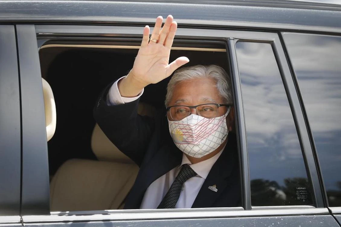 Former Deputy Prime Minister Ismail Sabri Yaakob waves to media as he leave after meeting with the King at national palace in Kuala Lumpur, Malaysia, Thursday, Aug. 19, 2021. (File/AP)