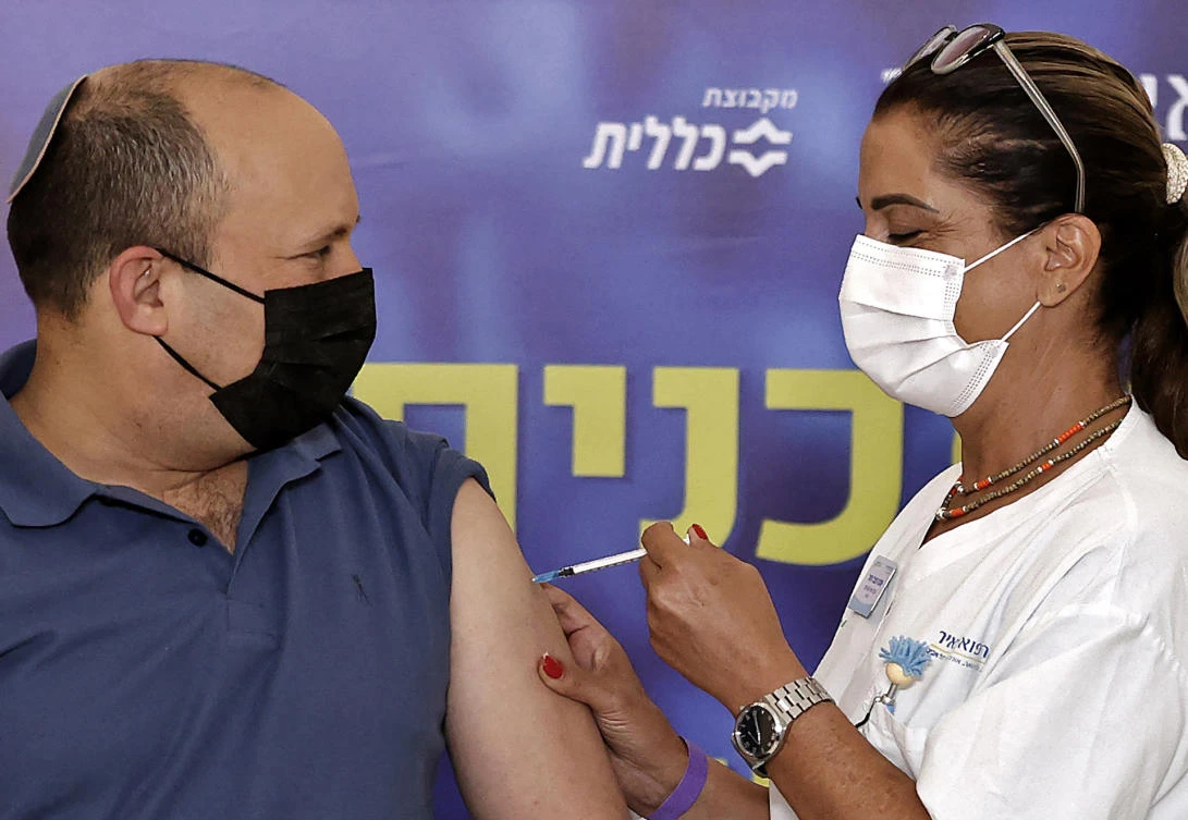 Israel’s PM Bennett receives Covid booster shot as infections surge