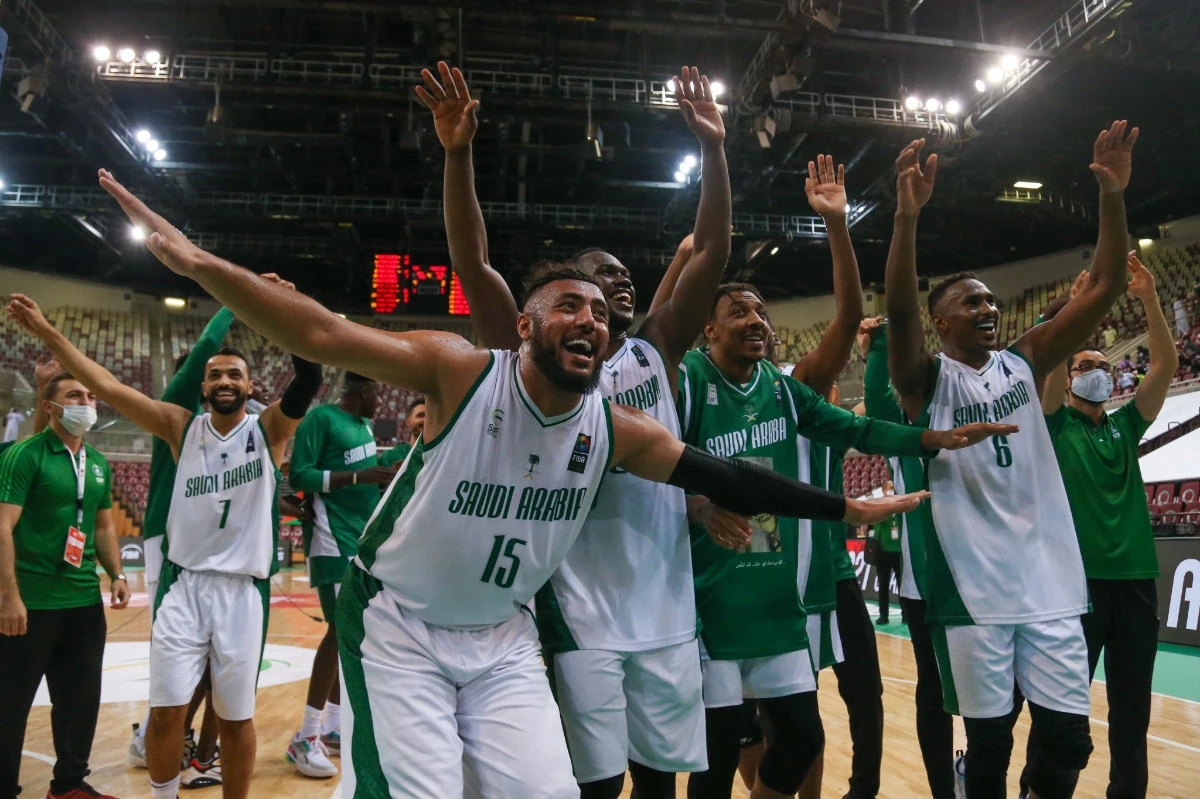 The Saudi players celebrate reaching the 2021 FIBA Asia Cup in Indonesia. (Supplied)