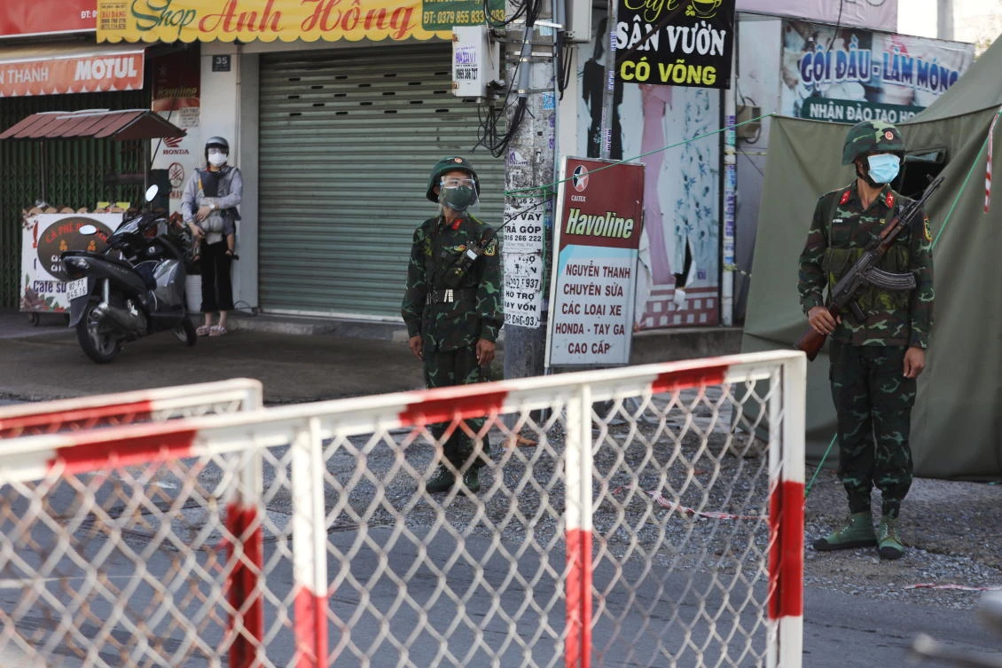 Above, a military check point during lockdown amid the coronavirus disease pandemic in Ho Chi Minh, Vietnam on Aug. 23, 2021. (Reuters)