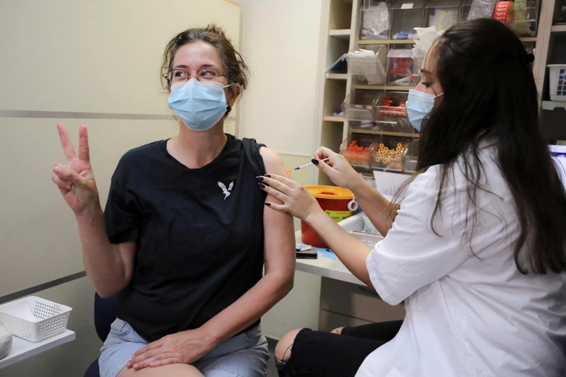 Scientists said booster shots are having an impact on infections, but other factors are likely contributing to the decline as well. (Reuters)