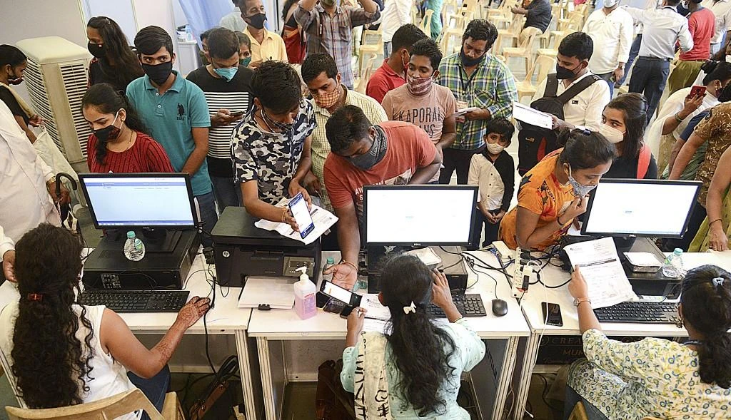 India has administered 596 million vaccine doses, giving at least one dose to nearly half of its 944 million adults and the required two doses to 14 percent. (AFP)