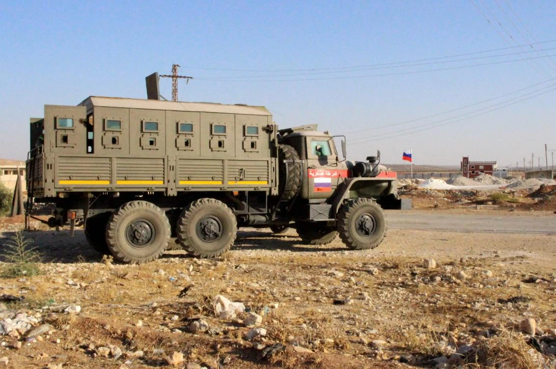 A military vehicle belonging to the Russian and Syrian coalition troops in Daraa Al-Balad in Syria’s southern province of Daraa on August 24. (AFP)