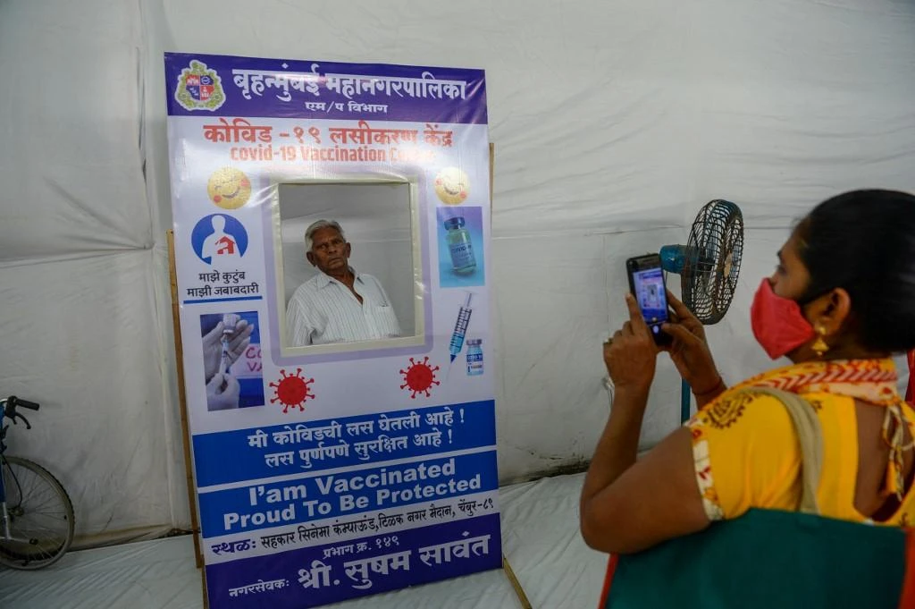 India has administered more than 622 million vaccine doses in total, giving at least one dose to more than half of its 944 million adults. (AFP)