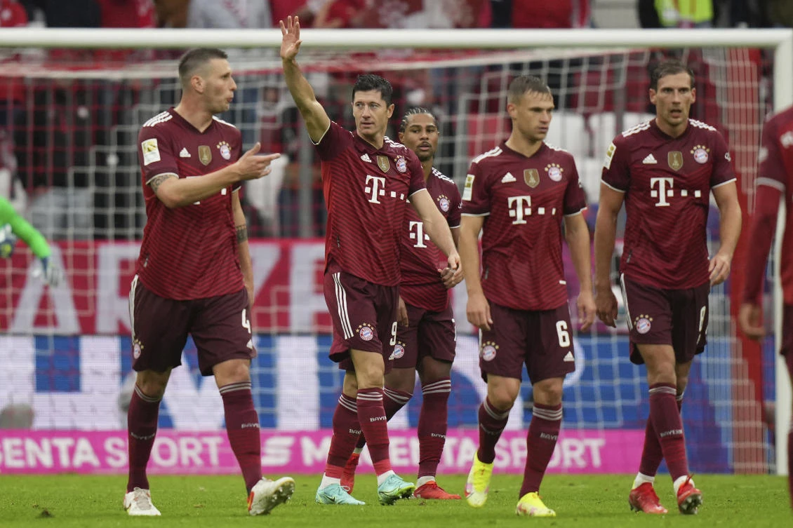 Bayern’s Robert Lewandowski celebrates after scoring his side’s second goal during the German Bundesliga match between Bayern Munich and Hertha Berlin at the Allianz Arena stadium in Munich on Saturday. (AP)