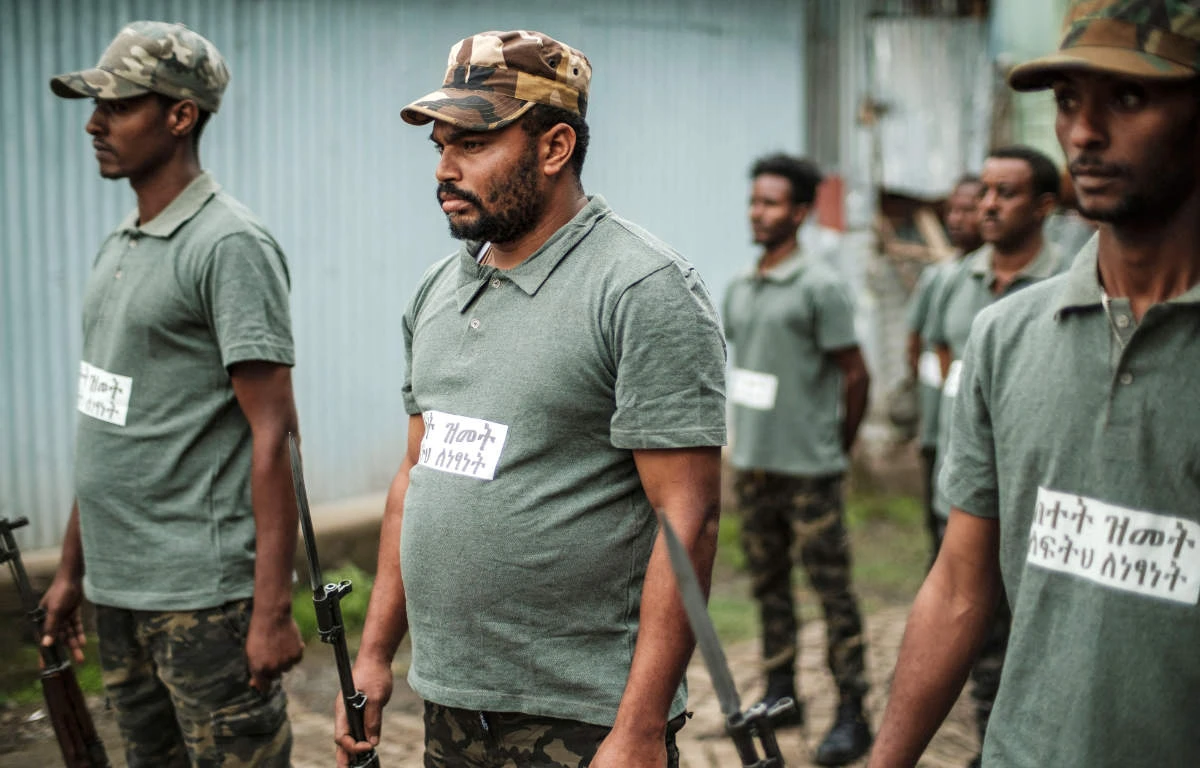 Recruits for reserves of Amhara regional forces stand during their graduation ceremony, in the city of Dessie, Ethiopia, on August 24, 2021. (AFP)