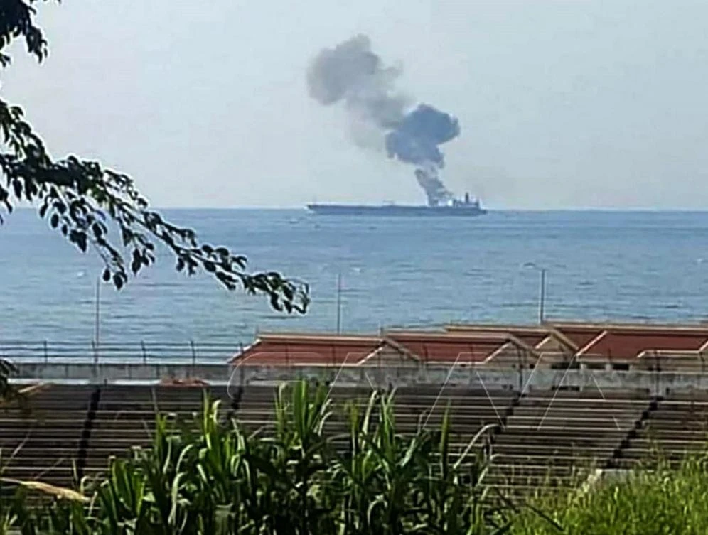 Above, smoke billows from a tanker off the coast of the western Syrian city of Baniyas in May 2021 after an attack blamed on Israel. Syria is heavily reliant on imported fuel as most of its resources are outside of government control. (FILE/SANA/AFP)