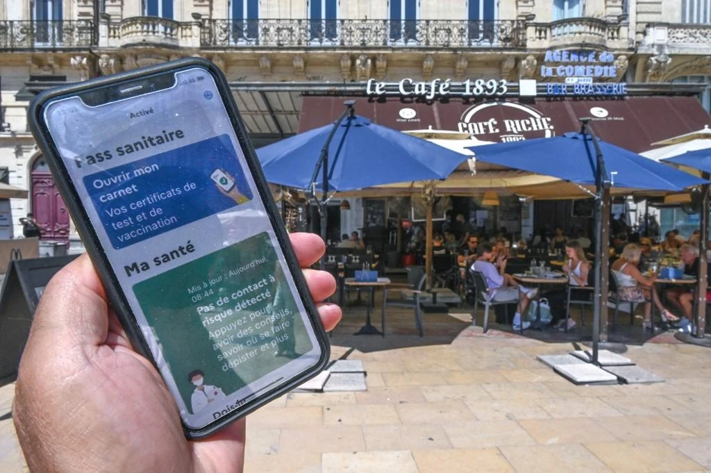 “Vaccine skepticism and science denial is holding us back from stabilizing this crisis,” WHO Europe director Hans Kluge said. Above, a resident shows his vaccination status in Montpellier, southern France. (AFP)