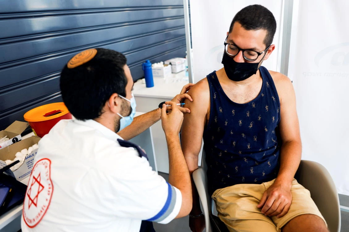 About 60 percent of Israel’s 9.3 million residents have received two shots of the vaccine, including 80 percent of adults. (Reuters)