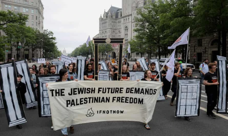 Demonstrators march towards Trump Hotel in Washington to protest against the relocation of the US embassy from Tel Aviv to Jerusalem. (Getty Images)