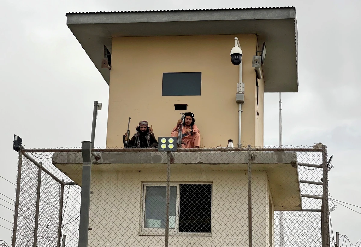 Taliban fighters man a security tower at the interior ministry in Kabul, Afghanistan, August 17, 2021. (Reuters)