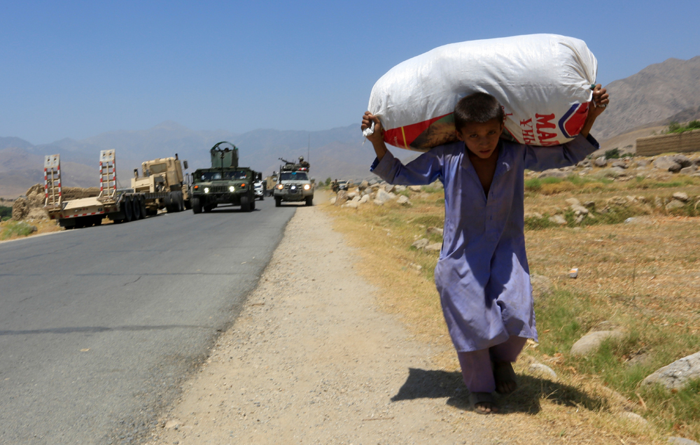 A young Afghan boy in the Alishing district of Laghman province, Afghanistan July 8, 2021. (Reuters)