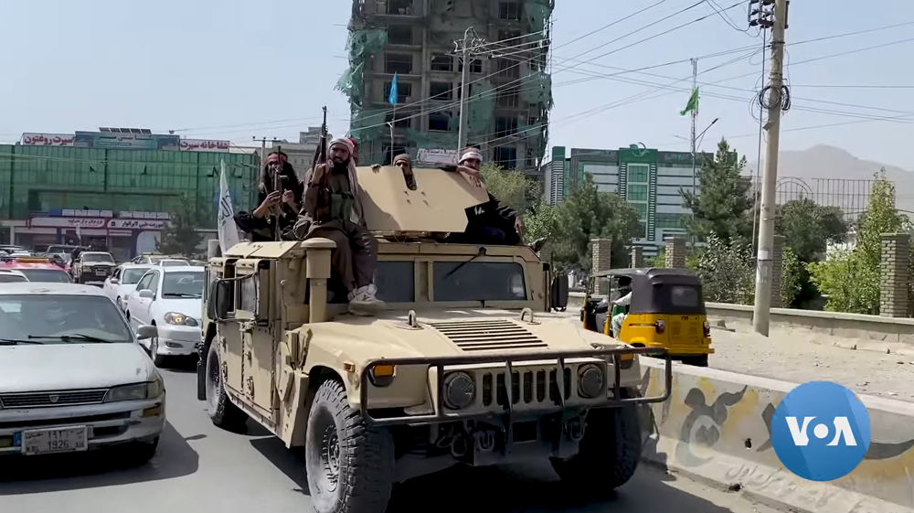 Taliban fighters patrol Kabul in a Humvee, Aug. 17, 2021. (Wikimedia Commons)