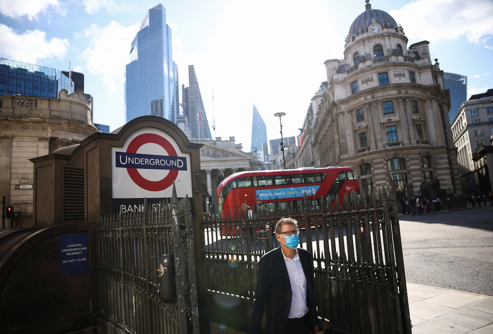 A person exits Bank underground station during morning rush hour, amid the COVID-19 pandemic in London, Britain, July 29, 2021. (Reuters)