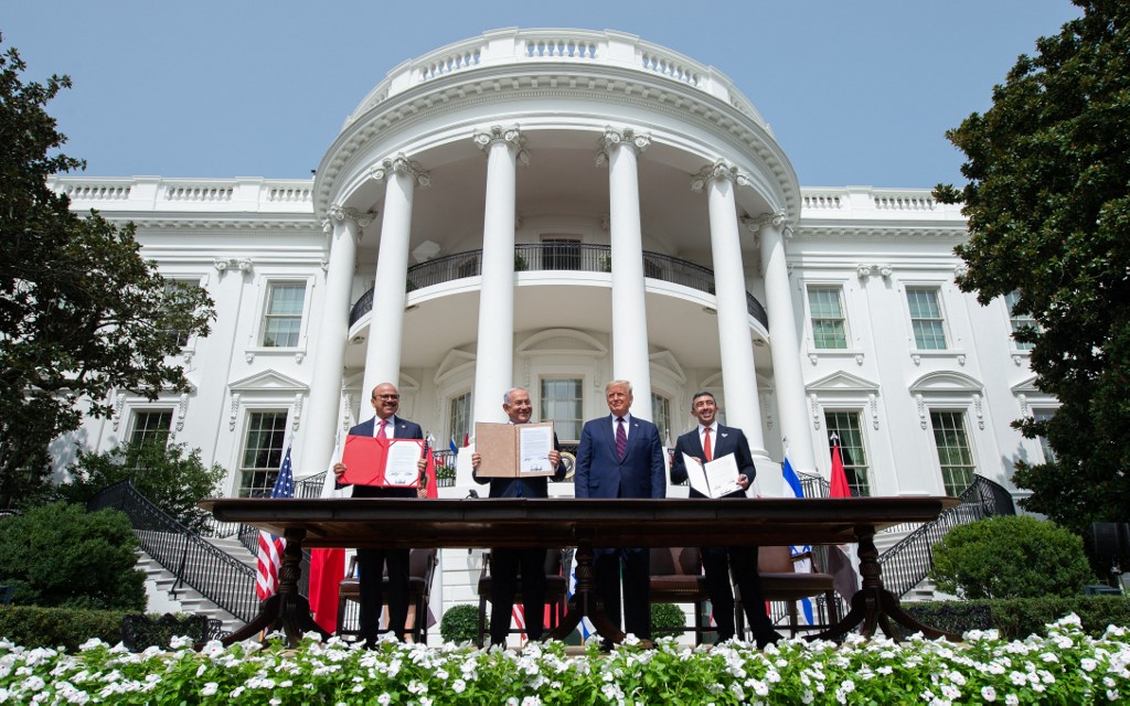 From left: Bahrain Foreign Minister Abdullatif Al-Zayani, Israeli Prime Minister Benjamin Netanyahu, US President Donald Trump and UAE Foreign Minister Abdullah bin Zayed Al-Nahyan during the signing of the Abraham Accords on Sept. 15, 2020. (AFP)