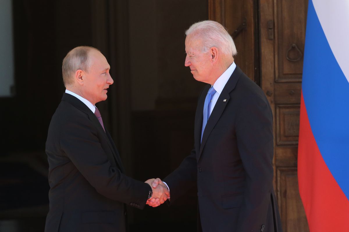 U.S. President Joe Biden and Russian President Vladimir Putin shake hands ahead of their summit in Geneva, Switzerland, June 16, 2021. (Getty Images)