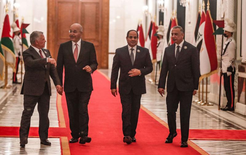 Iraqi President Barham Salih, 2nd left, and PM Mustafa Al-Kadhimi receive Abdel Fattah El-Sisi and King Abdullah, Baghdad, June 27, 2021. (AFP)