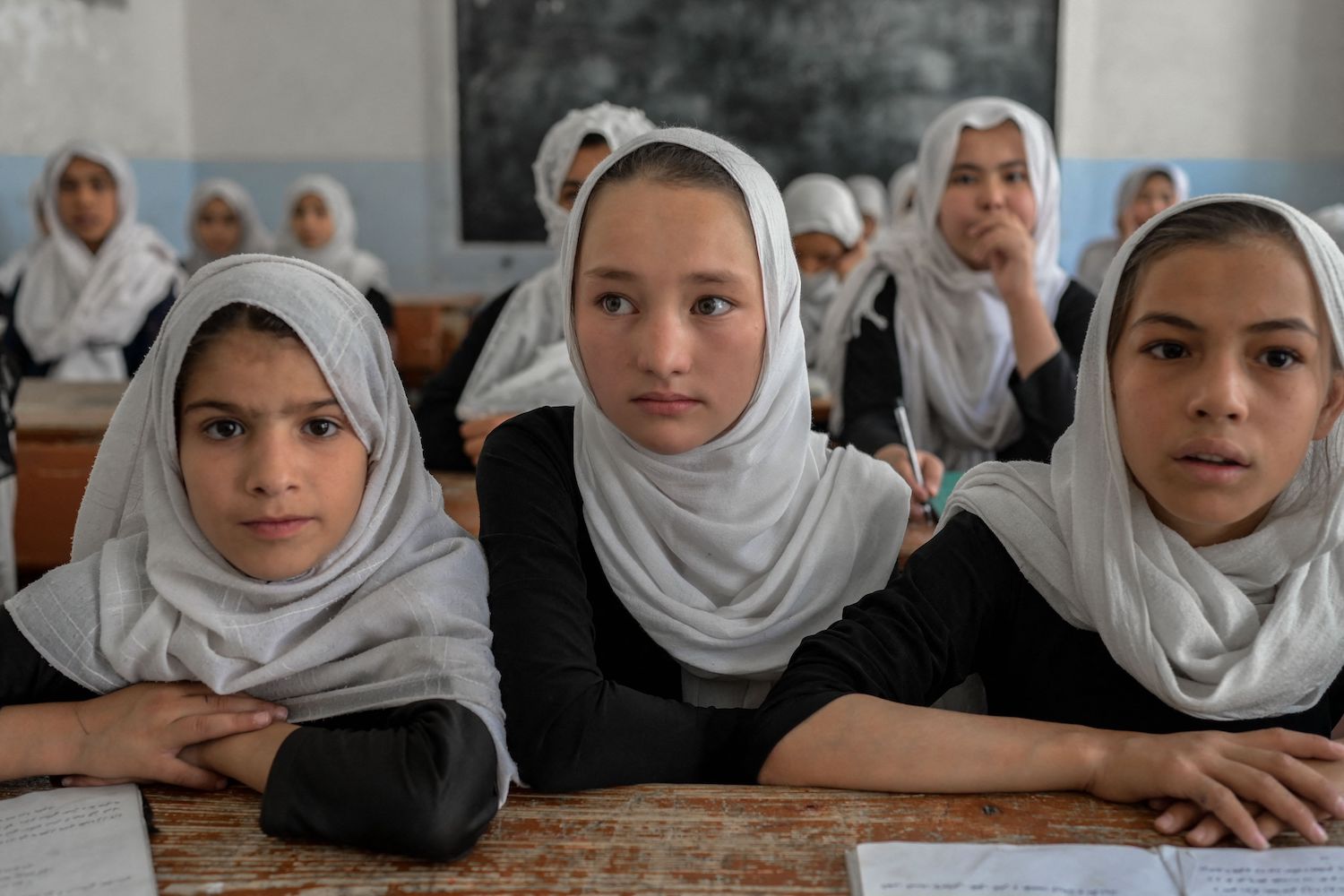 Afghan girls attend a class in a school in Kandahar on September 26, 2021. (AFP)