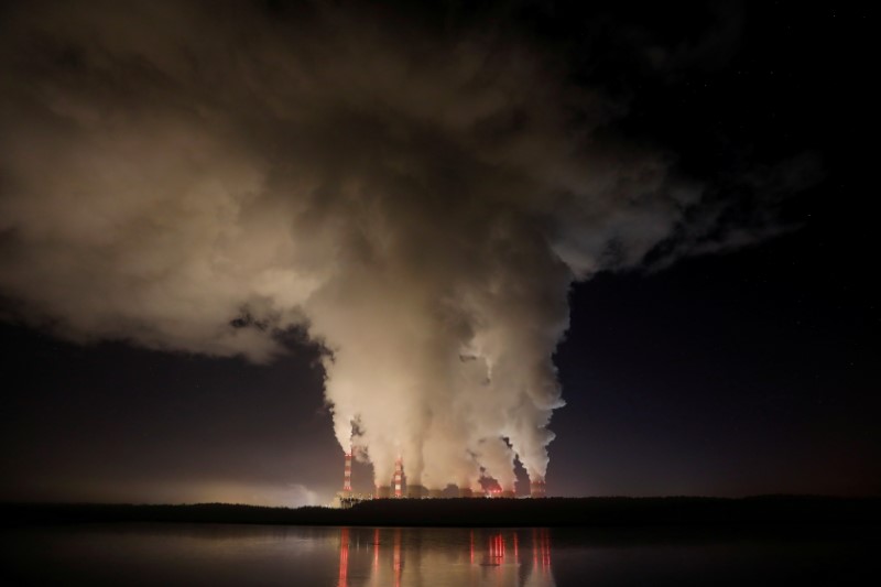 Smoke and steam billows from Belchatow Power Station, Europe's largest coal-fired power plant, Belchatow, Poland, Dec. 5, 2018. (Reuters)