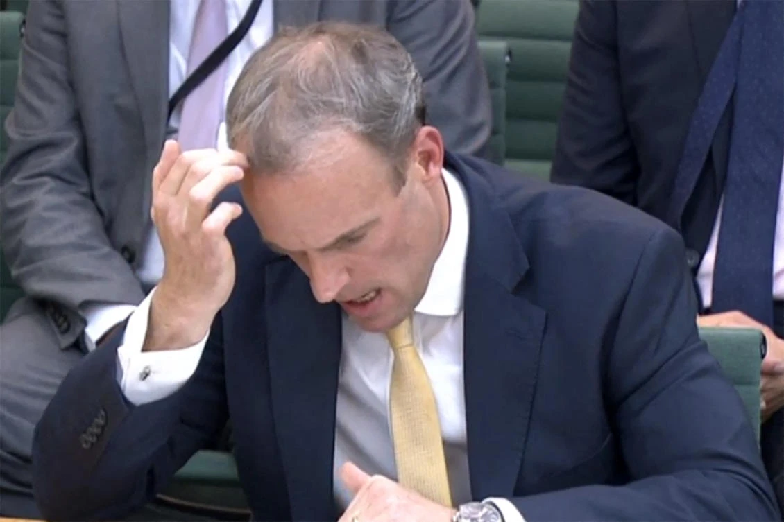 In this video grab, Britain's Foreign Secretary Dominic Raab gestures as he answers questions on Government policy on Afghanistan during a meeting of the Foreign Affairs Committee. (AFP)