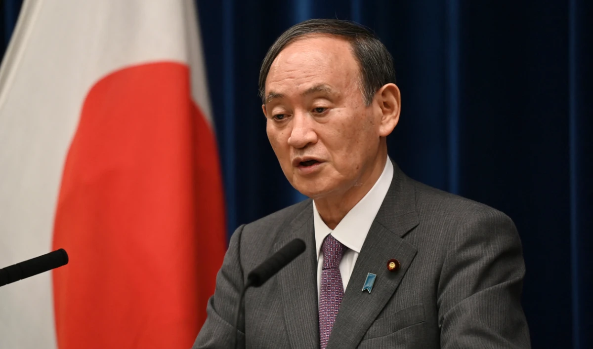 Suga’s denial of these reports comes after several days of tense negotiations and sudden twists involving Suga and the most powerful politicians in the ruling camp. (AFP/File)