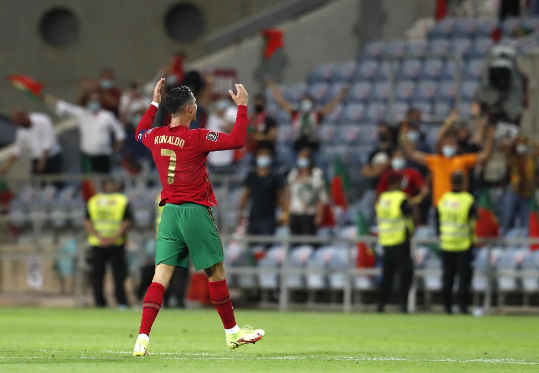 Portugal’s Cristiano Ronaldo celebrates after scoring his side’s first goal during the World Cup 2022 group A qualifying match between against Republic of Ireland at the Algarve stadium outside Faro on Wednesday. (AP)