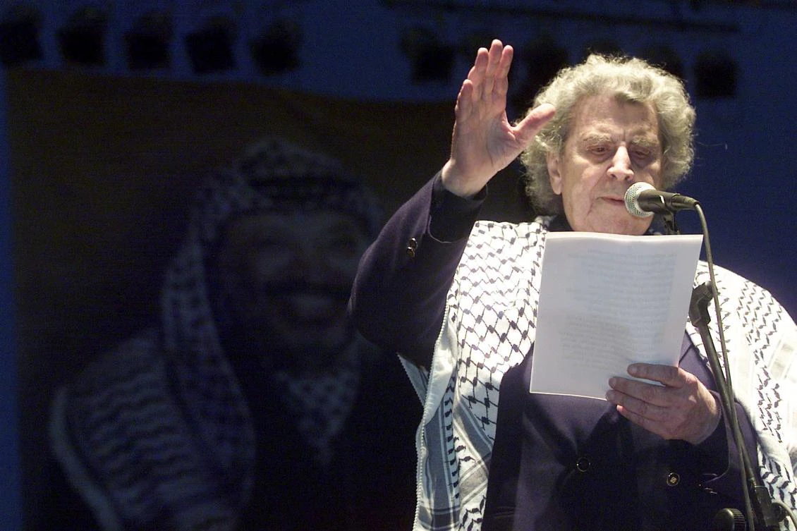 Greek composer Mikis Theodorakis speaks during a concert in support of Palestinian people in Syntagma Square, Athens, Greece, April 10, 2002. (EPA)