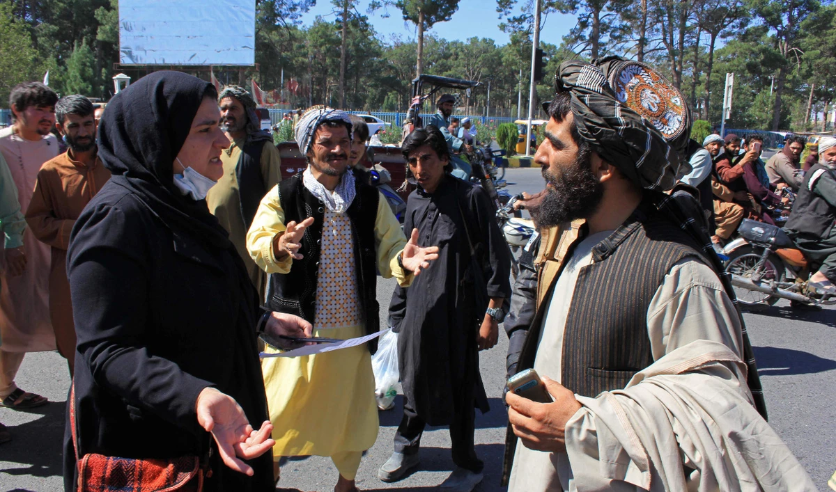 Defiant female protesters said they were willing to accept the burqa if their daughters could still go to school under Taliban rule. (AFP)