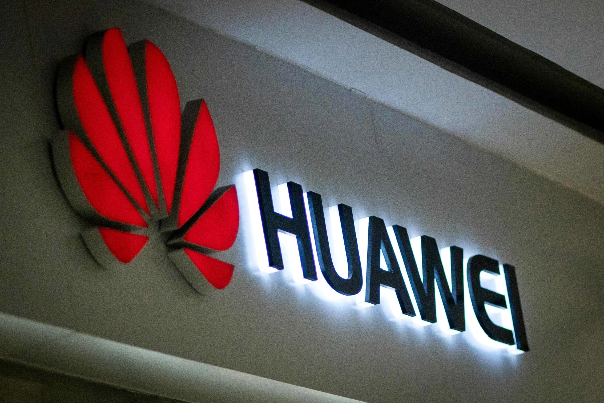 A Huawei logo is displayed at a retail store in Beijing on May 23, 2019. (AFP)
