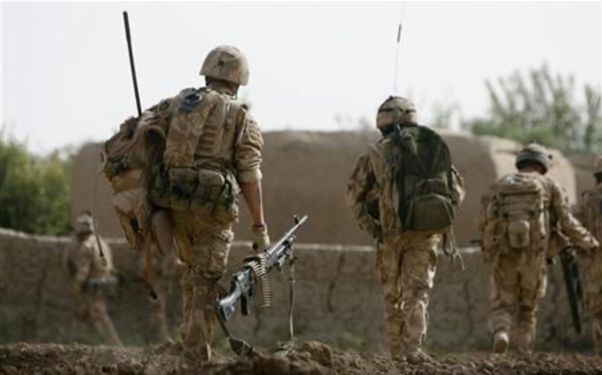 British minister says he was wrong on Afghan veterans taking their own life