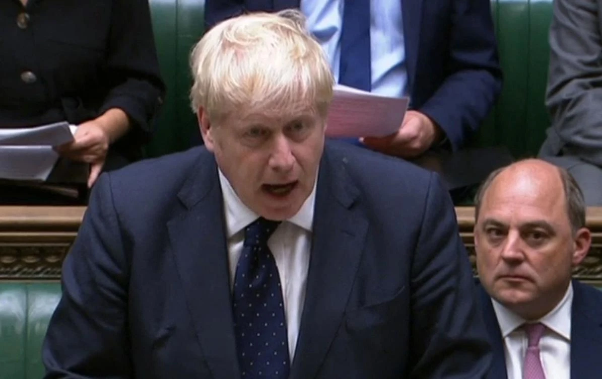 A video grab from footage broadcast by the UK Parliament’s Parliamentary Recording Unit (PRU) shows Britain’s Prime Minister Boris Johnson speaking during a statement on Afghanistan, in the House of Commons in London on Monday. (AFP)