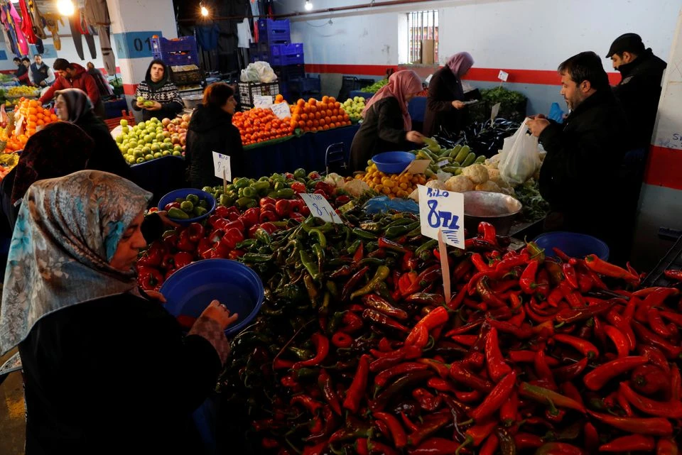 Turkey’s central bank chief says policy is tight enough; lira slides
