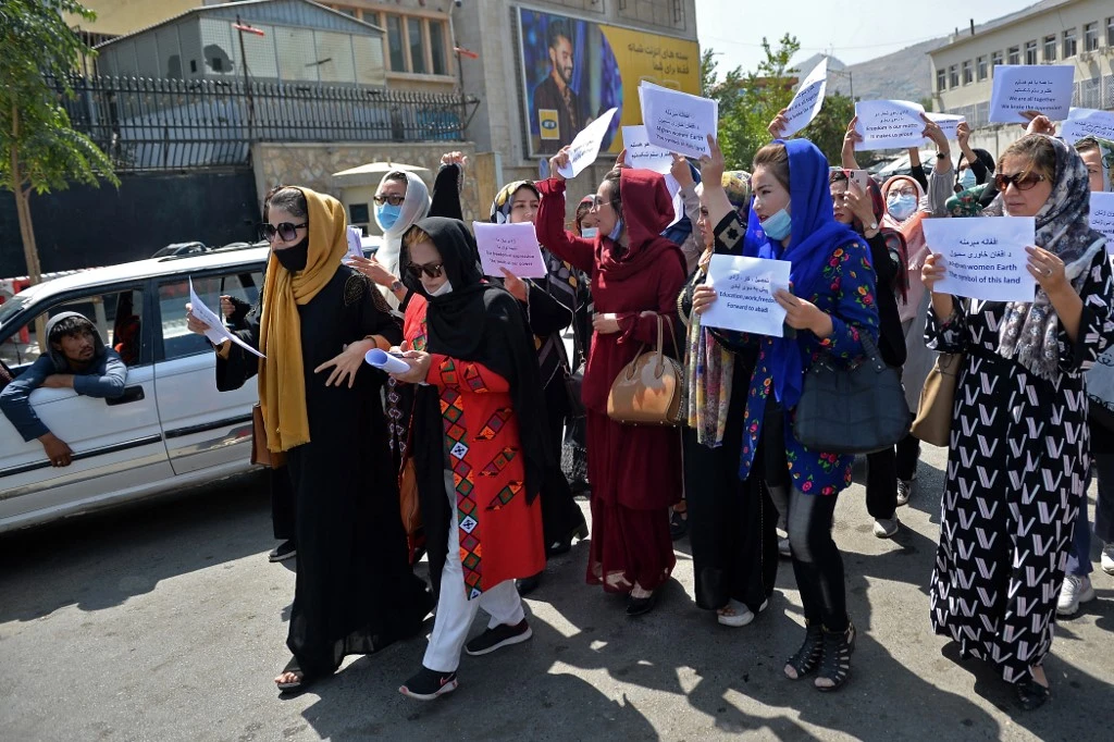 Afghan women take part in a protest march for their rights under the Taliban rule in the downtown area of Kabul on September 3, 2021. (AFP)