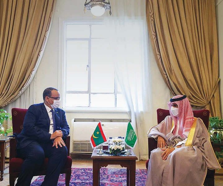 Saudi FM Prince Faisal bin Farhan (right) meets with Mauritanian FM Ismail Ould Cheikh Ahmed in Cairo. (SPA)