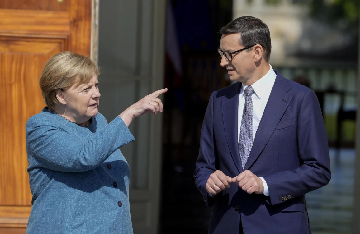 Merkel calls migrant push at EU’s border ‘unacceptable’