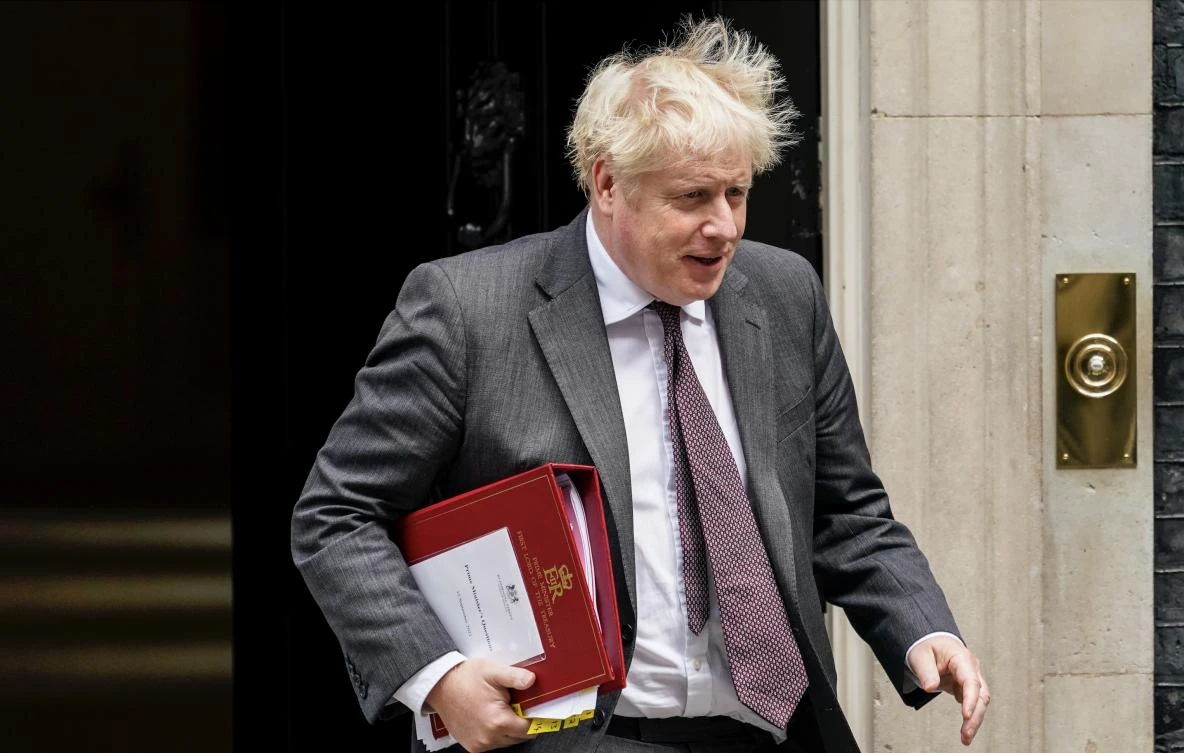 UK's PM demotes foreign minister in cabinet revamp