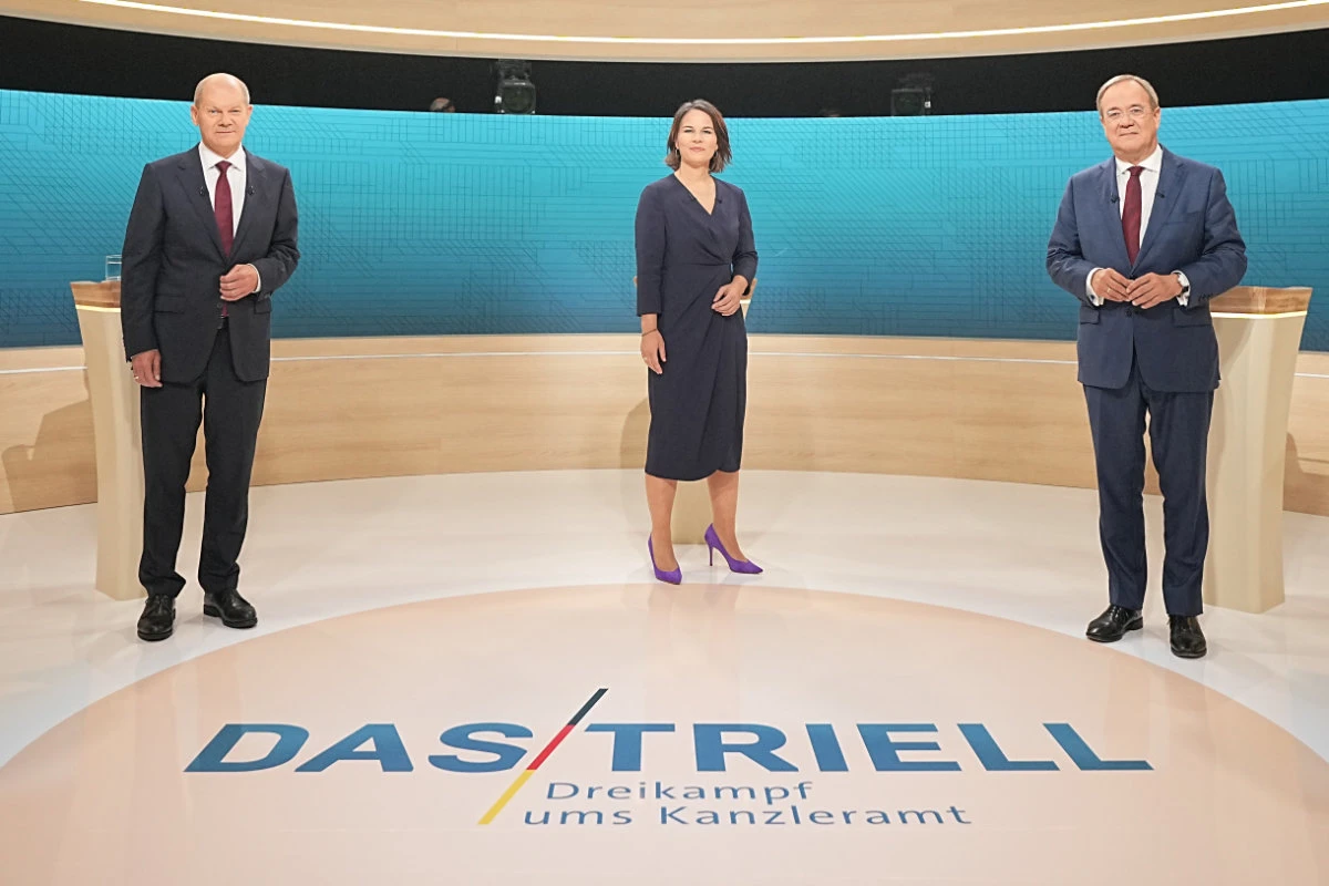 Political leaders Annalena Baerbock, Armin Laschet and Olaf Scholz join a televised debate of the candidates to succeed Angela Merkel as German chancellor on Sept. 12, 2021. (REUTERS/pool)