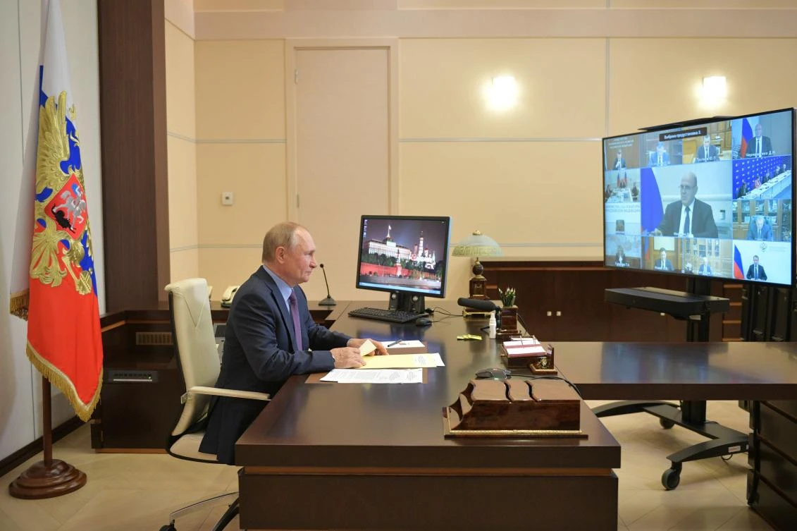 Russian President Vladimir Putin in recent months has resumed his work trips and face-to-face meetings, but many of his contacts are still required to spend two weeks in quarantine. (Kremlin Pool Photo via AP)