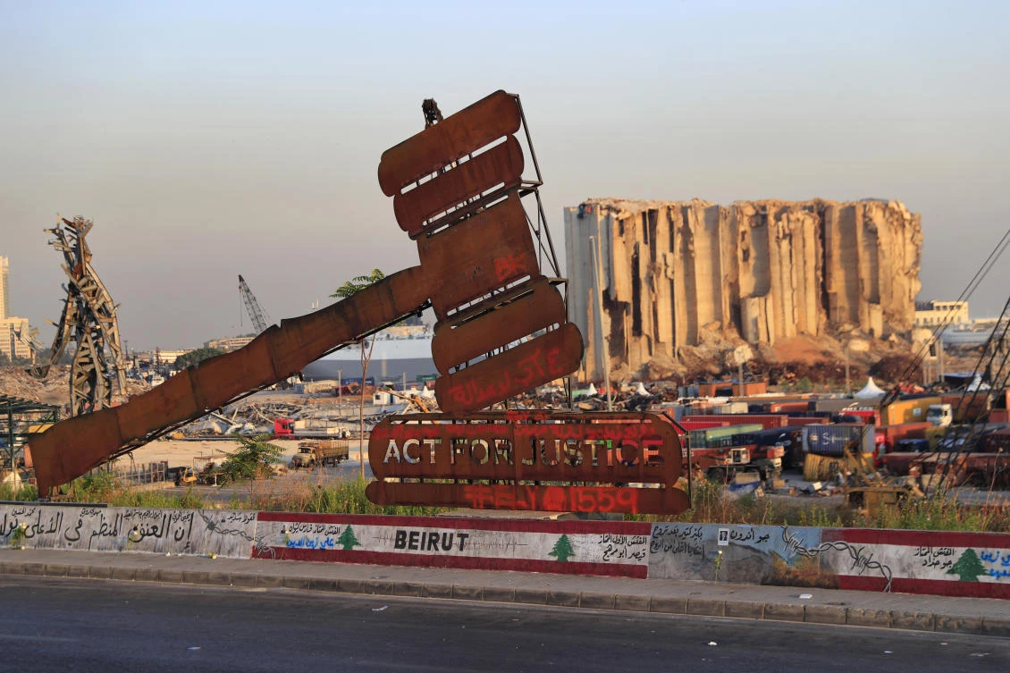 Beirut blast judge issues arrest warrant for ex-minister