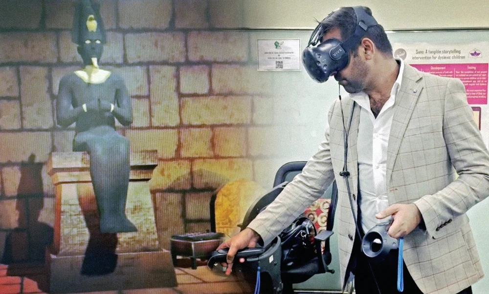 Dr. Ali Jawaid tests a program and equipment for VR-based therapy for dementia patients during a study at Lahore University of Management Sciences. (Supplied)