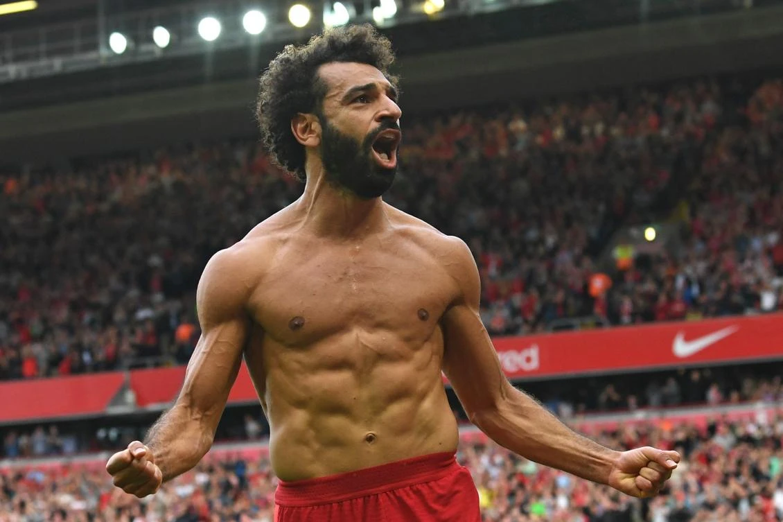 Liverpool's Egyptian midfielder Mohamed Salah celebrates after scoring their second goal against Crystal Palace. (AFP)